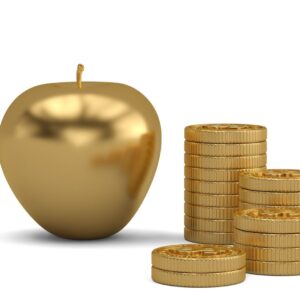 A gold apple sitting next to stacks of coins.